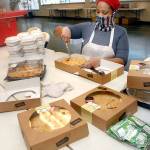 Koreena Hawkins of Port Angeles slices pies in preparation for the Nov. 25 carry-out lunch at the Salvation Army in Port Angeles. Photo by Keith Thorpe/Olympic Peninsula News Group