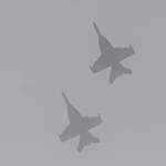Two U.S. Navy Growler jets from NAS Whidbey Island soar above Sequim View Cemetery Saturday. Sequim Gazette photo by Michael Dashiell