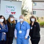 Working the COVID vaccination drive-up station Thursday are, from left, Jefferson Healthcare staffers Jaimie Hoobler, Brandy Boyd, Jess Cigalotti and Lori Banks. Diane Urbani de la Paz/Peninsula Daily News