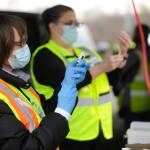 Lesli Mays, left, and Donna Short prepare COVID-19 vaccination shots at the Jamestown SKlallam Tribes clinic on Jan. 14. Sequim Gazette photo by Michael Dashiell