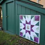 A barn quilt now adorns the side of the pump house structure at Pioneer Memorial Parkon East Washington Street. Sequim Gazette photo by Michael Dashiell