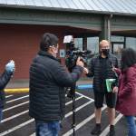 CNNs senior national correspondent Kyung Lah interviews Sequim mayor William Armacost after a Coffee with the Mayor session on Jan. 28 about QAnon as producer Kim Berryman and photojournalist Taka Yokoyama and record the conversation that appeared on a segment of Anderson Cooper 360 the next night. Armacost said he never publicly supported QAnon. Sequim Gazette photo by Matthew Nash