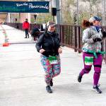 Pierre LaBossiere/Peninsula Daily News
Brady Simis of Renton, left and Angela Smith of Buckley get started on their 10K runs at the Elwha Bridge Run Saturday morning.