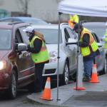 Volunteers help check in patients and provide information at the Jamestown Family Health Clinic vaccination event on Feb. 4 at Trinity United Methodist Church and Carrie Blake Community Park. Sequim Gazette photo by Michael Dashiell
