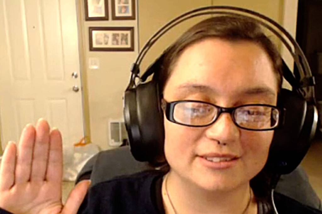 Rachel Anderson, a 2008 Sequim High grad, takes the oath of office on Tuesday, Feb. 16, after being appointed to the Sequim city council. Zoom photo