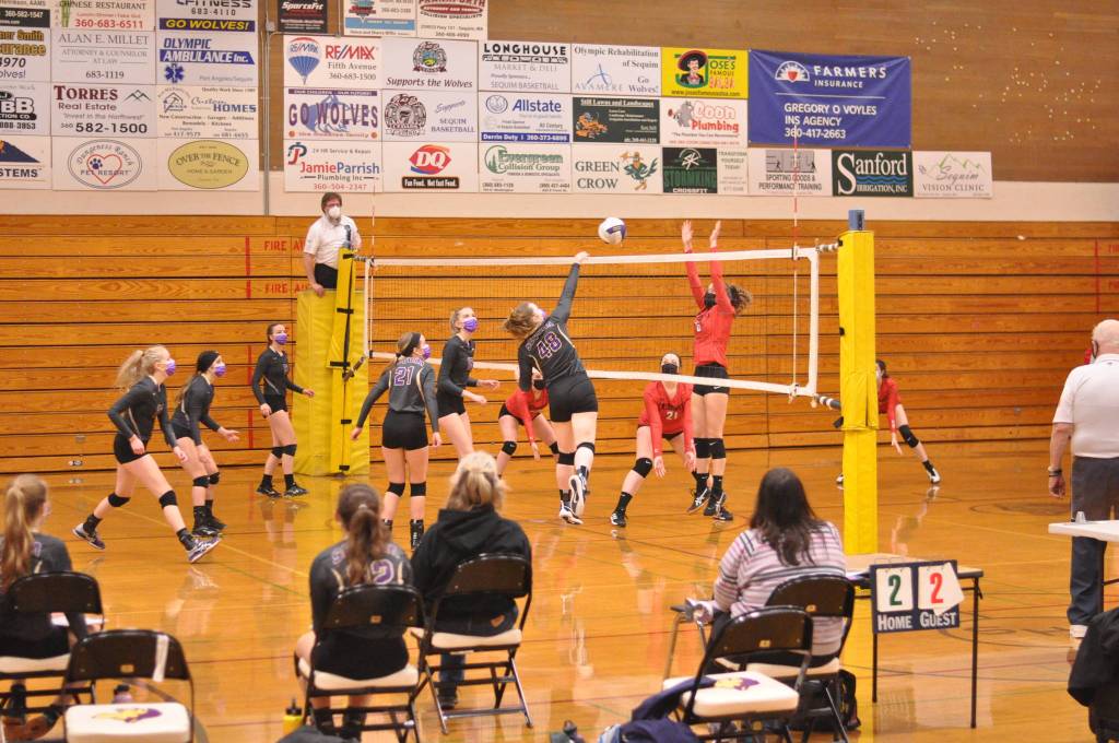 Sequims Malory Morey (48) looks for a big hit as she and the Wolves take on East Jefferson on Feb. 25. Photo by Wendy Morey