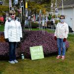 In Sunland North, Danette Bemis, left, and Kathy Tiedeman continue to hang cloth masks they make for free in Bemis front yard. Donations are accepted to help continue the effort, the friends said. Sequim Gazette photos by Matthew Nash