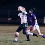Port Angeles Emilia Long, left, and Sequims Abby Schroeder vie for the ball in the first half of Port Angeles 2-1 win at Sequim on Feb. 26. Sequim Gazette photo by Michael Dashiell