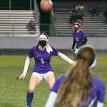 Sequims Rileigh Van Dyken, center, looks to settle a throw-in from a teammate in the first half of a Feb. 26 home match-up with Port Angeles. Sequim Gazette photo by Michael Dashiell