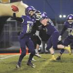 Sequim quarterback Kobe Applegate looks for a receiver in the first half of the Wolves 27-15 win over South Kitsap on March 5. Sequim Gazette photo by Michael Dashiell