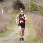 Sequim junior Riley Pyeatt breaks out to a big lead as she helps the Wolves with a one-point win over Klahowya at Voice of America Park on March 6, Sequims lone home meet of the abbreviated 2021 season. Sequim Gazette photo by Michael Dashiell