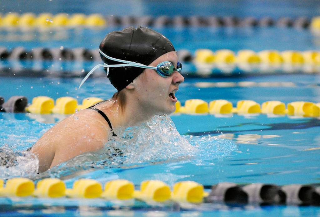Sequims Melanie Byrne competes in the 100 breaststroke in the Wolves final regular season meet on March 5.