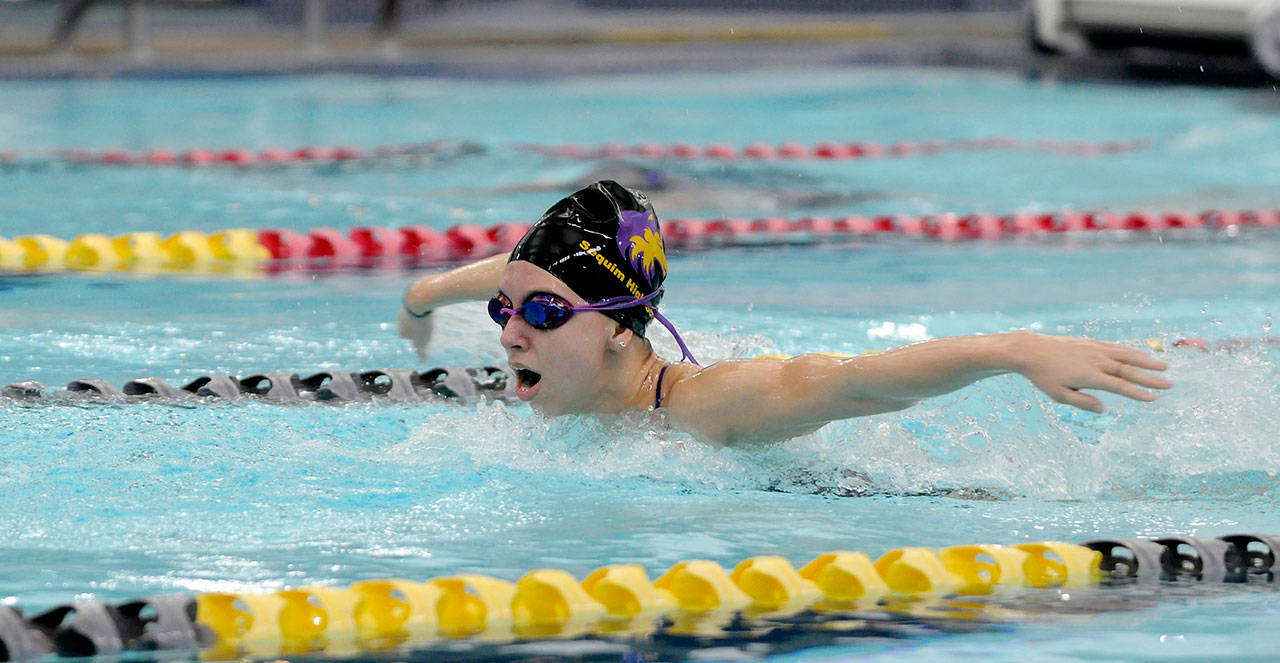 Sequims Hiilei Robinson competes in the 200 individual medley as the Wolves clock their final regular season times of the season on March 5. Sequim Gazette photo by Michael Dashiell
