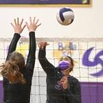 Sequims Jayla Julmist, right, looks for a spike as Klahowyas Lexie Scott looks for a block in a March 8 league match. Sequim Gazette photo by Michael Dashiell