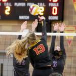 Sequims Jolene Vaara, left, and Amanda Weller vie for a block in the Wolves match at Kingston on March 10. Photo by Mark Krulish/North Kitsap Herald