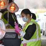 Certified medical assistant Lu Thu Hardin prepares a COVID-19 vaccination dose at the Jamestown Family Health Clinic drive-thru clinic in Sequim on March 4. Sequim Gazette photo by Michael Dashiell
