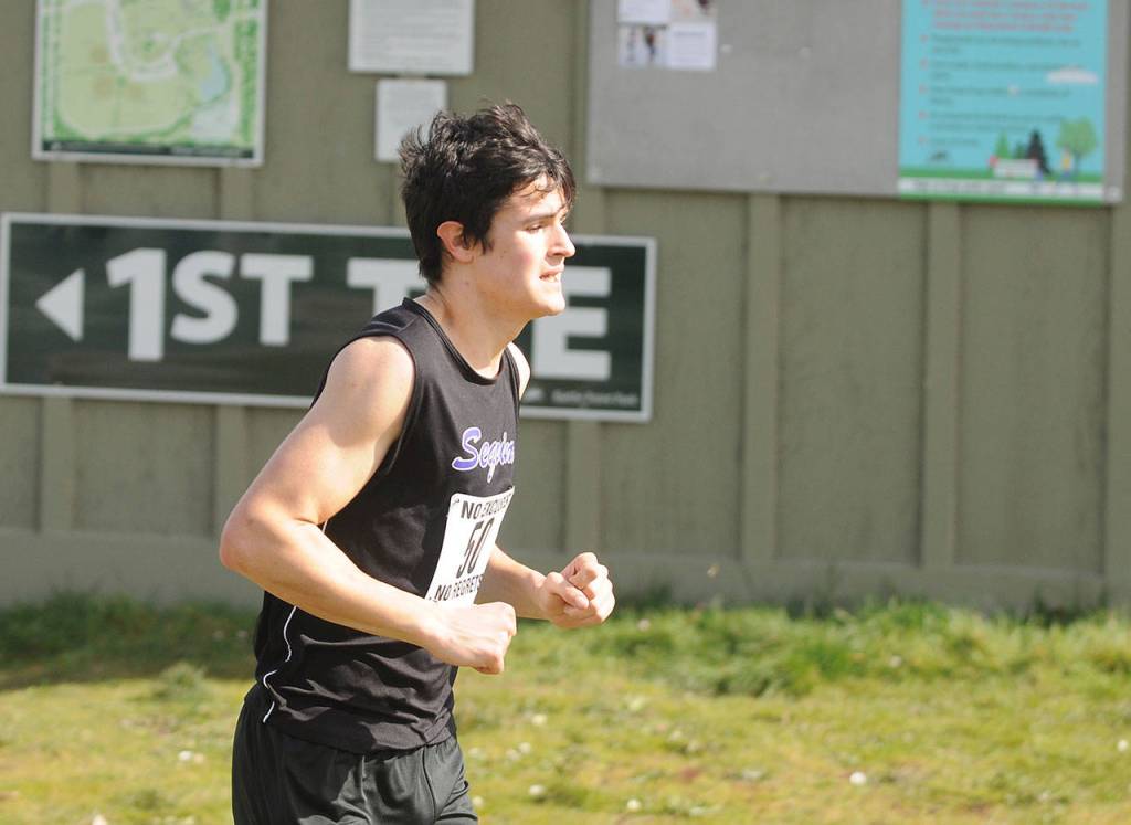 Sequim High junior Henry Hughes races in the Olympic League championship race on March 13 at Battle Point Park on Bainbridge Island. Sequim Gazette photo by Michael Dashiell