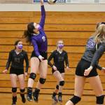 Sequims Allie Gale rises up for a back row spike as teammates (from left) Kalli WIker, McKenna Hastings and Kendall Hastings (foreground) look on. Gale had four aces and a team-high 17 digs in the Wolves season-ending win over Central Kitsap on March 20. Sequim Gazette photo by Michael Dashiell