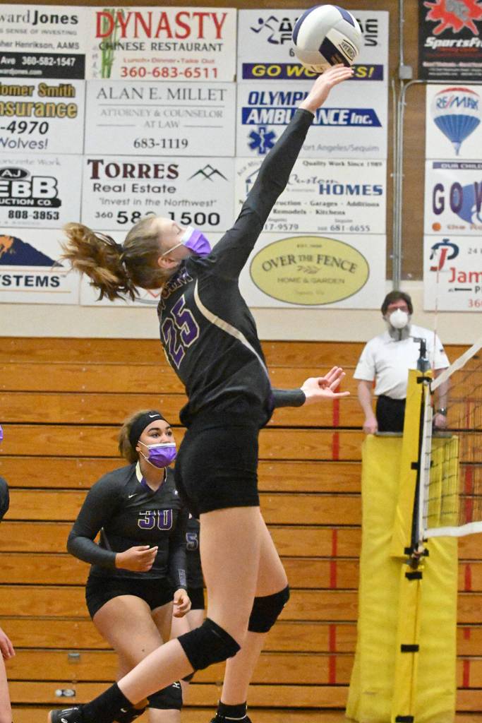 With senior teammate Jayla Julmist looking on, Sequim freshman Jolene Vaara vies for a point in a league crossover match against Central Kitsap on Saturday. Sequim Gazette photo by Michael Dashiell