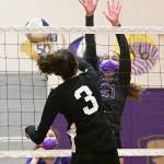 With teammate Allie Gale looking on, Sequims Kalli Wiker (21) tries to block Central Kitsaps Allie Baldridge in a league crossover match on March 20. Sequim Gazette photo by Michael Dashiell
