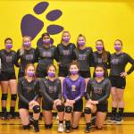 Sequim Highs varsity volleyball squad is all smiles after a league crossover victory against Central Kitsap on March 20. They include (back row, from left) head coach Jennie Webber Heilman, Kalli Wiker, McKenna Hastings, Jayla Julmist, Kendall Hastings, Jolene Vaara, Amanda Weller and Malory Morey, with (front row, from left) Kelsi Bergeson, Jordan Hegtvedt, Allie Gale and Jessica Asselin. Not pictured: Lindsay Swanson. Photo by Wendy Morey