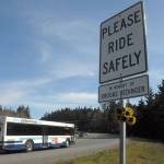 A sign honoring Brooke Bedinger, who was killed on her motorcycle near the spot, stands on the side of U.S. Highway 101 near Morse Creek east of Port Angeles. (Keith Thorpe/Peninsula Daily News)