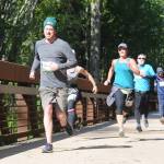 Runners approach the finish line at the 2019 Railroad Bridge Park Run in April 2019. This years event features live competition as well as a virtual option and is set for Saturday, April 24. With construction set at the park, the start/finish line has been shifted about a mile west of the park but features the bridge on the out-and-back 5k and 10k courses. Sequim Gazette file photo by Michael Dashiell