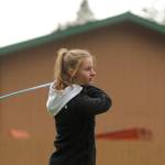 Sequims Jessica German, then a sophomore, watches a drive from the second hole at The Cedars at Dungeness during a league match in 2019; Sequim Gazette file photo by Michael Dashiell
