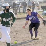 Sequim third baseman Kailin Lopez makes a play to throw out Port Angeles Taylor Worthington in the fifth inning of PAs 11-6 win over Sequim on March 30. Sequim Gazette photo by Michael Dashiell