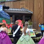 Last years Sequim Irrigation Festival royalty, from left, princess Brii Hingtgen, prince Logan Laxson, queen Lindsey Coffman, and princess Alicia Pairadee look at their 2020 float for the first time. This years royalty float will be revealed at 4:45 p.m. Saturday, April 3 online at <a href="http://www.irrigationfestival.com" target="_blank">www.irrigationfestival.com</a>. Sequim Gazette file photo by Matthew Nash