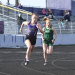 Sequims Riley Pyeatt, left, and Port Angeles Lauren Larson square off in the 800 meters at a league track and field meet in Sequim on March 31. Larson won the event in 2:18, with Pyeatt second in 2:31. Sequim Gazette photo by Michael Dashiell
