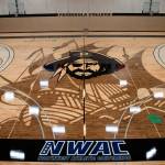 A community-led fundraising drive garnered $200,000 to replace the gym floor at Peninsula College. PC players, fans and representatives will dedicate the floor this Saturday, April 3, at halftime of the mens game against visiting Everett. Photo courtesy of Peninsula College