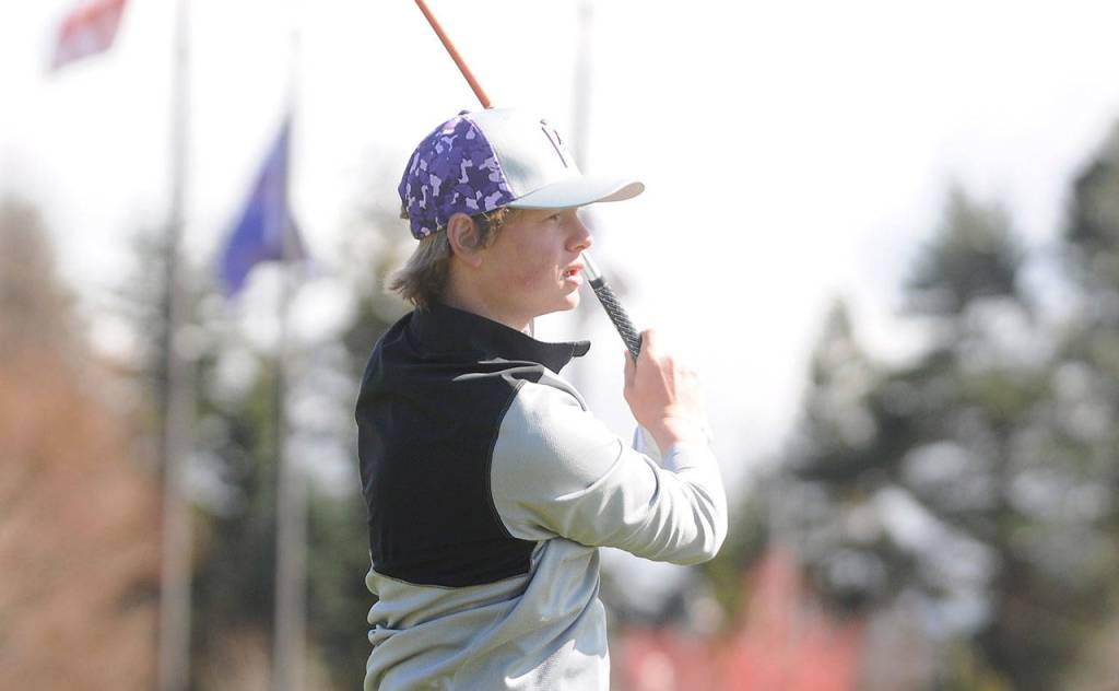 Sequims Ben Sweet watches his tee shot from the first hole at The Cedars at Dungeness on April 8. Sequim Gazette photo by Michael Dashiell