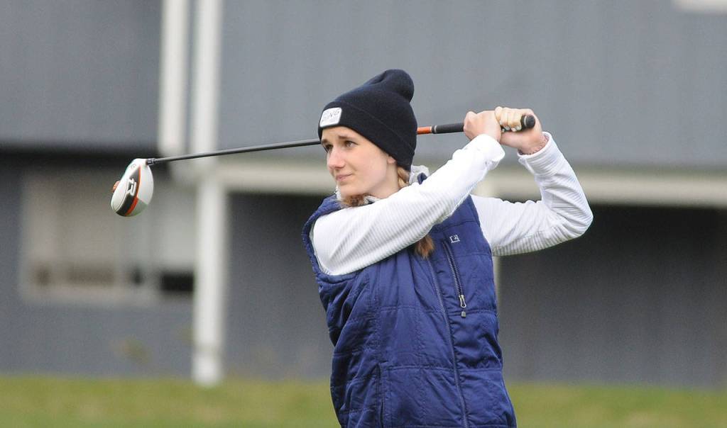 Sequims Hannah Wagner watches her tee shot from the third hole at The Cedars at Dungeness on April 8. Sequim Gazette photo by Michael Dashiell