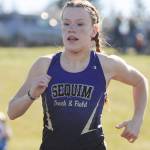 SHS junior Riley Pyeatt races to a personal best in the 1,600 meters (5:18), taking one of her three first place finishes at a league meet in Port Angeles on April 14. Sequim Gazette photo by Michael Dashiell
