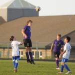 Sequims Brandon Charters (13) gets his head on a ball in the second half of the Wolves 6-1 win over Olympic. Sequim Gazette photo by Michael Dashiell