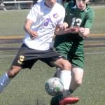 Sequims Christian Gonzales, left, and Port Angeles Josiah Long battle for the ball in Port Angeles on April 17. Photo by Keith Thorpe/Olympic Peninsula News Group