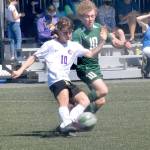 Sequims Eli Gish, left, and Port Angeles Damon Gundersen compete for control at midfield at Peninsula College on April 17. Photo by Keith Thorpe/Olympic Peninsula News Group