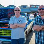 At right: Co-producers Steve Harwood and Lynie Staus enjoy a sunny day for a car show at Sequim Village Center on April 17, including a refurbished 1956 Chevrolet (bottom right) and a number of Cobras (bottom left). Photos by Bob Lampert