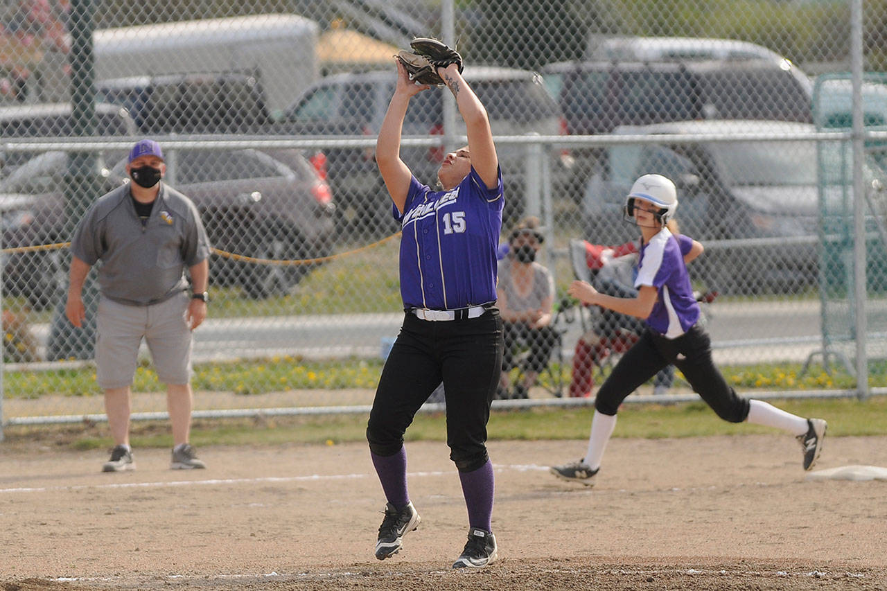Sequims Addie Smith fouls off a pitch as the Wolves take on North Kitsap on April 21. Sequim Gazette photo by Michael Dashiell
Sequim third baseman Kailyn Lopez snags a pop-up in the Wolves April 21 game against visiting North Kitsap. Sequim topped the Vikings 6-2.