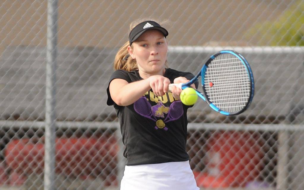 Sequims Melissa Porter and doubles partner Allie Gale (not pictured) take on Bremertons Liza Allen and Connie Quenga in Sequim on April 21. Gale and Porter won in straight sets, 6-0 and 6-0. Sequim Gazette photo by Michael Dashiell
