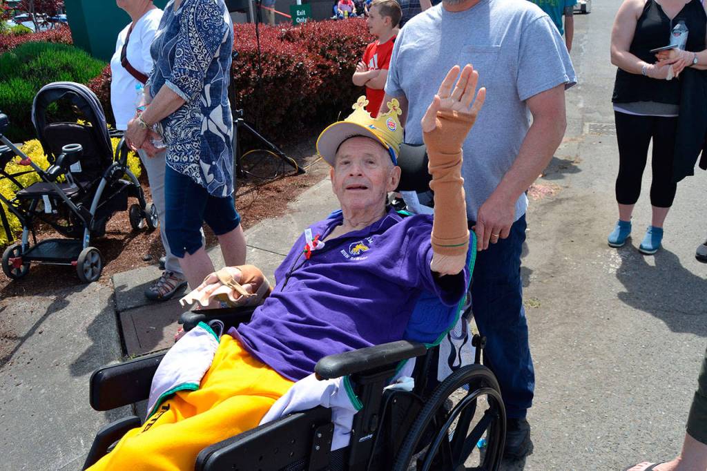Myron Tetrud waves hello at the 2017 Sequim irrigation Festival Grand Parade. Sequim Gazette file photo by Matthew Nash