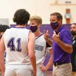 Sequim coach Greg Glasser talks to his players in the second half of the Wolves win over East Jefferson on May 10. Sequim Gazette photo by Michael Dashiell