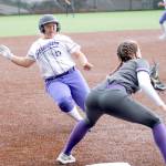 Sequims Lily Fili slides into third base against North Kitsap at the Olympic League tournament in Silverdale on May 1. North Kitsap edged the Wolves, 2-1. Photo by Mark Krulish/Kitsap News Group