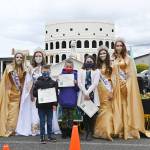 Runner-ups in the Sequim Irrigation Festival Button Design Contest get a photo op with the 2021 royalty Saturday at the Innovative Arts and Crafts Fair. Contest entrants included (front row, from left) Tyler McCarthey, Emma Rhodes and Emerson Jacobs. Not pictured are runner-ups Daniel Colwill and Ryan Adkisson, and button design winner Mason Blake. Royalty include, back row from left, princess Zoee Kuperus, queen Hannah Hampton, and princesses Allie Gale and Sydney VanProyen. Sequim Gazette photo by Michael Dashiell