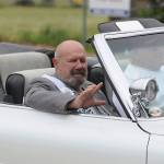 Grand Pioneer Dave Cameron says hi to onlookers on North Sequim Avenue during the May 8 Grand Parade. Sequim Gazette photo by Michael Dashiell