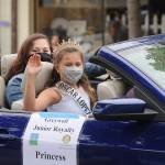 Aleah Daniels, who along with Evie Judd represents Greywolf Elementary School on the 2021 Sequim Irrigation Festival Junior Royalty court, waves to the crowd in downtown Sequim. Sequim Gazette photo by Michael Dashiell