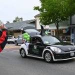 The Sound Community Bank Orca car winds up the 2021 Irrigation Festival Grand Parade/Procession through downtown Sequim on May 8. Sequim Gazette photo by Michael Dashiell