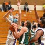 Sequims Jolene Vaara, left, looks to block a shot by Port Angeles Jaida Wood in the first half of the Roughriders 67-58 win at Sequim on May 12. Sequim Gazette photo by Michael Dashiell