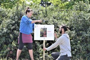 Katy Bowman and Michael Kaffel, instructors at Nutritious Movement in Sequim, practice staking panels for Sundays book walk at Finnriver Farm & Cidery in Chimacum. The mile-long walk is a free event featuring Bowmans new book, Grow Wild. Photo by Diane Urbani de la Paz/Olympic Peninsula News Group